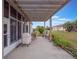 Covered patio with pergola and outdoor seating at 27504 Stoney Brook Dr, Leesburg, FL 34748