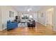 Bright living room featuring hardwood floors and comfortable seating at 3200 Woodridge Dr, The Villages, FL 32162