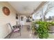 Peaceful screened porch, perfect for outdoor relaxation with ceiling fan at 3200 Woodridge Dr, The Villages, FL 32162