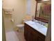 Clean bathroom with vanity, toilet, and shower/tub combo at 32218 Sweet Briar Court, Leesburg, FL 34748