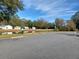 Quiet community with pond and lush Florida landscaping at 32218 Sweet Briar Court, Leesburg, FL 34748