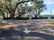 Community fitness center building with parking lot and landscaping at 32218 Sweet Briar Court, Leesburg, FL 34748