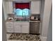 Clean and efficient kitchen with granite countertops and white cabinets at 32218 Sweet Briar Court, Leesburg, FL 34748