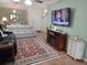 Spacious living room with ample natural light and comfy sofas at 32218 Sweet Briar Court, Leesburg, FL 34748
