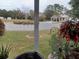View from the screened porch overlooking the community at 32218 Sweet Briar Court, Leesburg, FL 34748