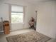 Bedroom with built-in wardrobe and window at 3243 Mansfield St, The Villages, FL 32162