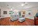 Spacious living room featuring hardwood floors and neutral color palette at 3347 Empire Ave, The Villages, FL 32163