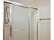 Shower stall with sliding glass door and shower head at 3347 Empire Ave, The Villages, FL 32163