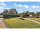 Landscaped community area with gazebo and fountain at 34205 Island Dr, Leesburg, FL 34788