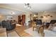 Spacious living room, hardwood floors, comfortable seating at 34205 Island Dr, Leesburg, FL 34788