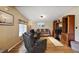 Living area with comfortable seating and built-in entertainment center at 34205 Island Dr, Leesburg, FL 34788