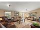 Relaxing living room with comfortable sofas and hardwood floors at 34205 Island Dr, Leesburg, FL 34788