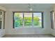 Bright bedroom features a large window offering ample natural light and scenic views at 3554 Oracle Ct, The Villages, FL 32163