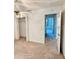 Bright main bedroom includes large closet, ceiling fan and doorway to living area at 3554 Oracle Ct, The Villages, FL 32163