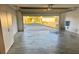 Spacious garage with cabinets and storage space at 3554 Oracle Ct, The Villages, FL 32163