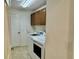 Functional laundry room with a modern washer and dryer, along with cabinet storage at 3554 Oracle Ct, The Villages, FL 32163