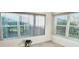 Bright living room with many large windows allowing for great natural light at 3554 Oracle Ct, The Villages, FL 32163