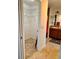 Open view of a main bathroom with a walk-in closet, shower, and vanity at 3554 Oracle Ct, The Villages, FL 32163