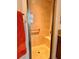 Shower room with tiled walls, glass door, and a comfortable built-in bench at 3554 Oracle Ct, The Villages, FL 32163