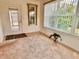 Inviting sun room with large windows offering natural light and scenic views at 3554 Oracle Ct, The Villages, FL 32163