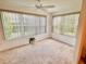 Bright sun room with many windows and neutral carpet at 3554 Oracle Ct, The Villages, FL 32163