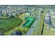 Aerial view showing tennis courts and community pathways at 4442 Shannon Loop, The Villages, FL 32163