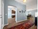 Open entryway with views of the kitchen and dining area at 4442 Shannon Loop, The Villages, FL 32163