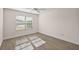 Bedroom with hardwood floors, a window with blinds, and ample natural light at 507 Delfin Rd, The Villages, FL 32163