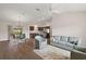 Open concept living space features high ceilings and flows into dining area and kitchen at 507 Delfin Rd, The Villages, FL 32163