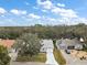 Community overview, showcasing several homes and lush green spaces at 5505 Tangelo St, Leesburg, FL 34748