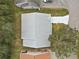Top-down view of house, showing gray roof and driveway at 5505 Tangelo St, Leesburg, FL 34748
