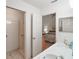 Bathroom with shower and double vanity at 5505 Tangelo St, Leesburg, FL 34748