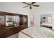 Bright bedroom with mirrored wardrobe and a view of another room at 5505 Tangelo St, Leesburg, FL 34748