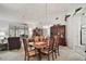 Bright dining room with wooden table and chairs at 5505 Tangelo St, Leesburg, FL 34748