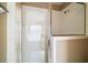 Clean bathroom with shower stall and tile surround at 5616 Illumination Ln, Leesburg, FL 34748