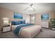 Spacious bedroom with a king-size bed and plenty of natural light at 5616 Illumination Ln, Leesburg, FL 34748