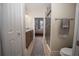Modern bathroom with double vanity, walk-in shower, and linen closet at 871 Cr 548, Bushnell, FL 33513