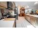 Open kitchen features stainless steel appliances and an island at 871 Cr 548, Bushnell, FL 33513