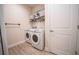 Laundry room with washer, dryer, and additional storage at 871 Cr 548, Bushnell, FL 33513