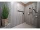 Large walk-in shower with modern tile and built-in shelving at 871 Cr 548, Bushnell, FL 33513