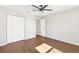 Bright bedroom with wood floors and double door closet at 9139 Se 155Th Pl, Summerfield, FL 34491