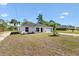 Beautiful single-story home featuring well-kept landscaping and a freshly paved driveway at 9139 Se 155Th Pl, Summerfield, FL 34491
