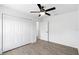 Bright bedroom with wood-look floors and spacious closet at 9167 Se 155Th Pl, Summerfield, FL 34491