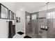 Spa-like bathroom with walk-in shower, modern finishes, and ample storage at 9287 Sw 102Nd Avenue Rd, Ocala, FL 34481