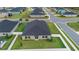 Aerial view of backyard with grass and white fence at 9334 Sw 57Th Ave, Ocala, FL 34476