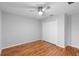 Simple bedroom with wood flooring and a double door closet at 9334 Sw 57Th Ave, Ocala, FL 34476