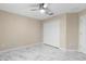 Bedroom with marble floors, neutral walls and ceiling fan at 9334 Sw 57Th Ave, Ocala, FL 34476