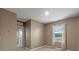 Bedroom with window, ceiling fan and neutral walls at 961 Lido Dr, Howey In The Hills, FL 34737