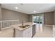 Kitchen island with sink and dishwasher; granite counters at 961 Lido Dr, Howey In The Hills, FL 34737