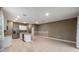 Modern kitchen featuring granite countertops and white cabinets at 961 Lido Dr, Howey In The Hills, FL 34737